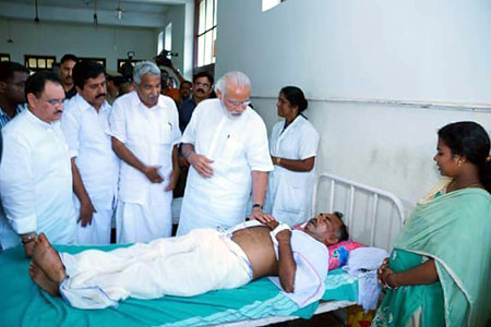 Prime Minister Narendra Modi visiting the injured of Paravoor tragedy